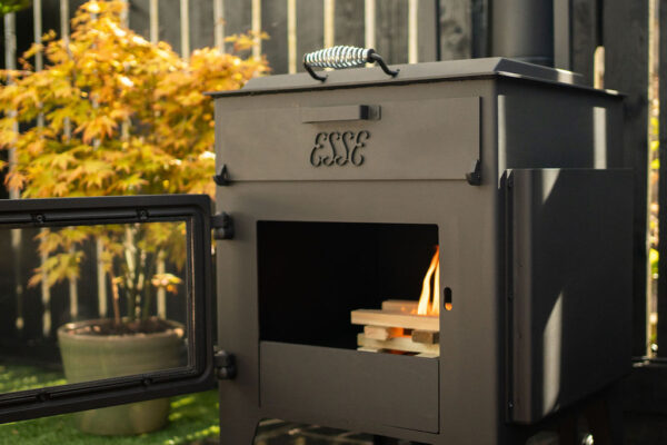 ESSE garden stove door open and kindling